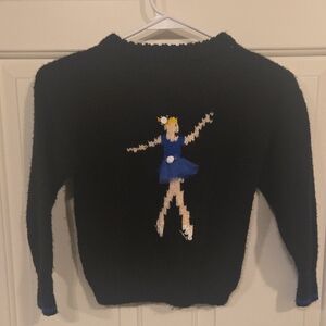 Elegant Black Sweater with Blue Dancer Design